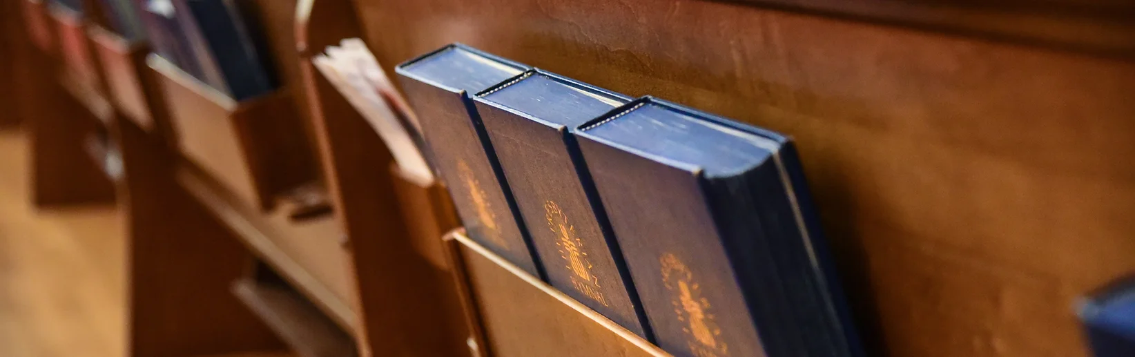 bibles in a church pew